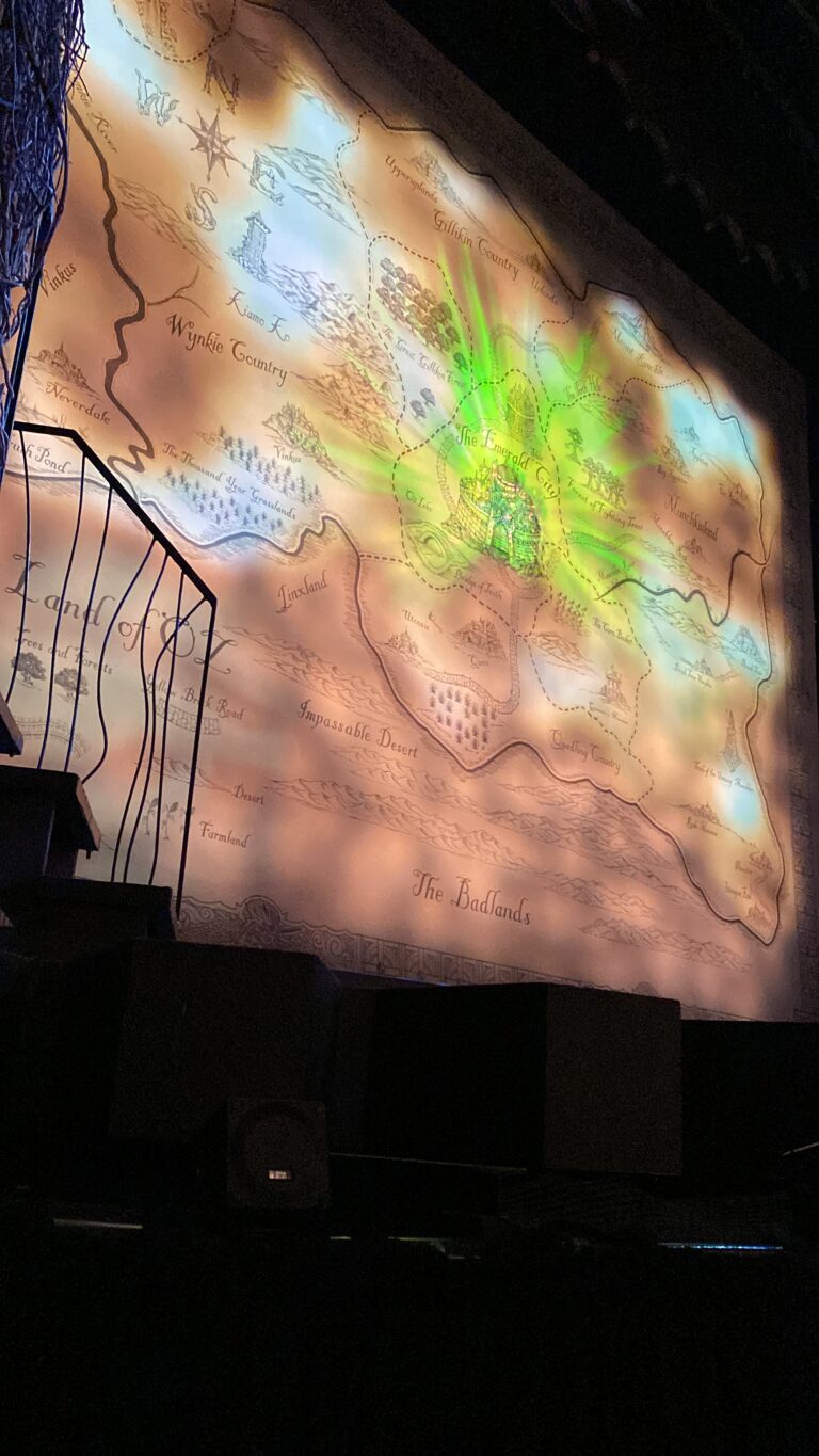 The curtain showing a map of Oz at Wicked.